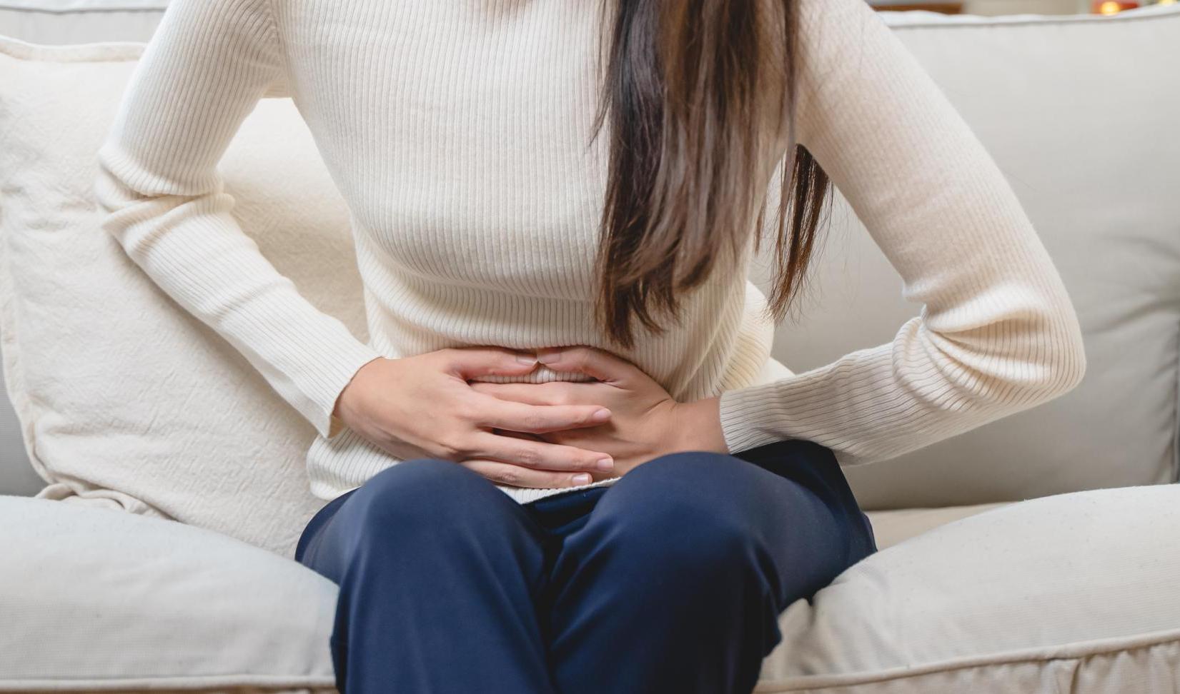 woman have stomach pain from menstruation.